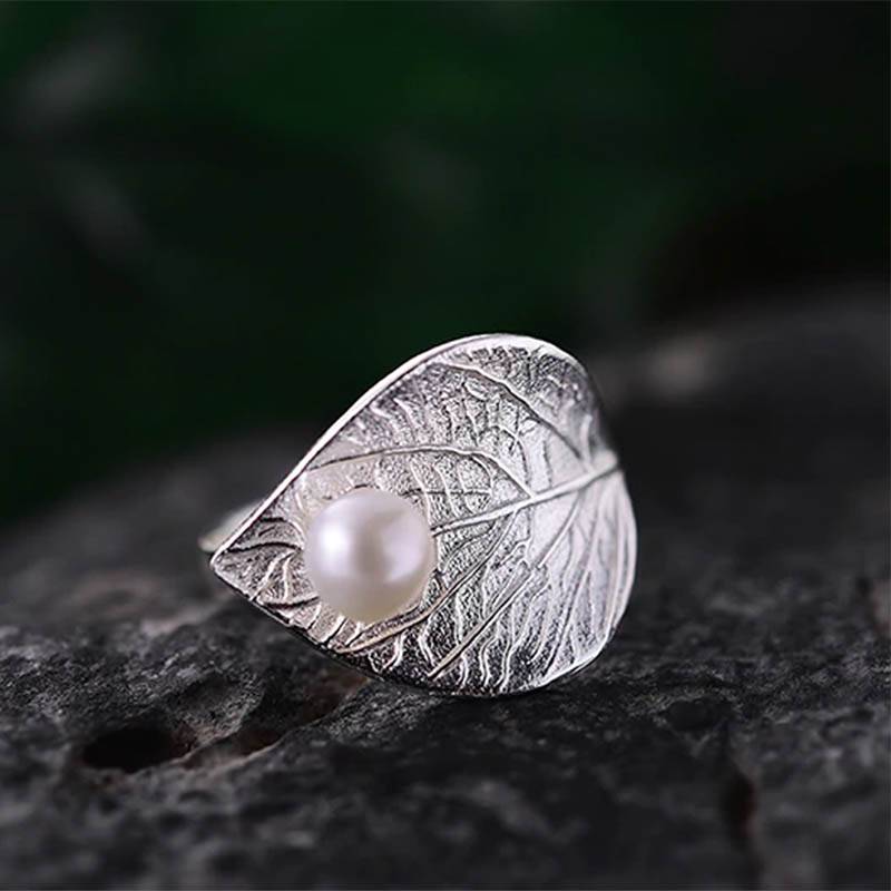 PEARL ON A LEAF RING Rings