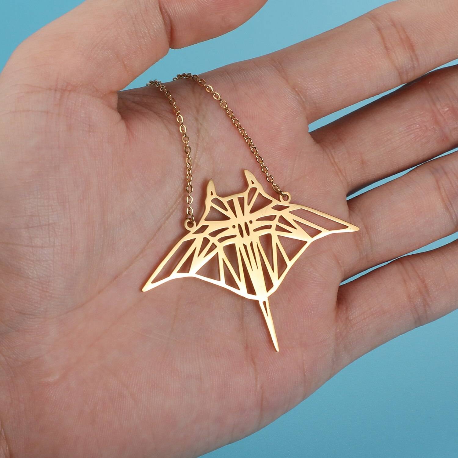 Sensitive Stingray Origami Necklace in hand