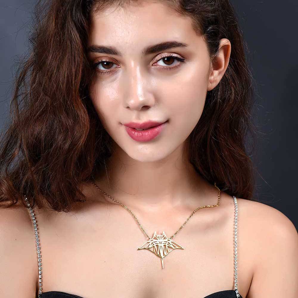Sensitive Stingray Origami Necklace gold being worn