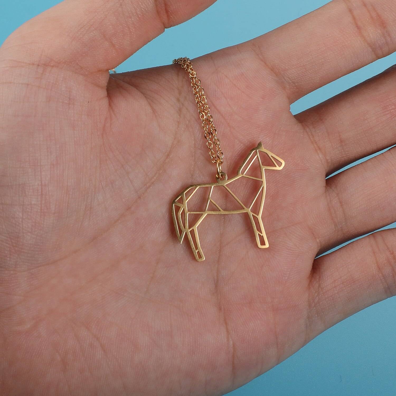 Noble Horse Origami Necklace in hand