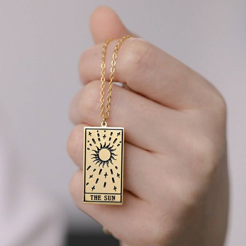 Tarot Pendant Charm Necklace in hand