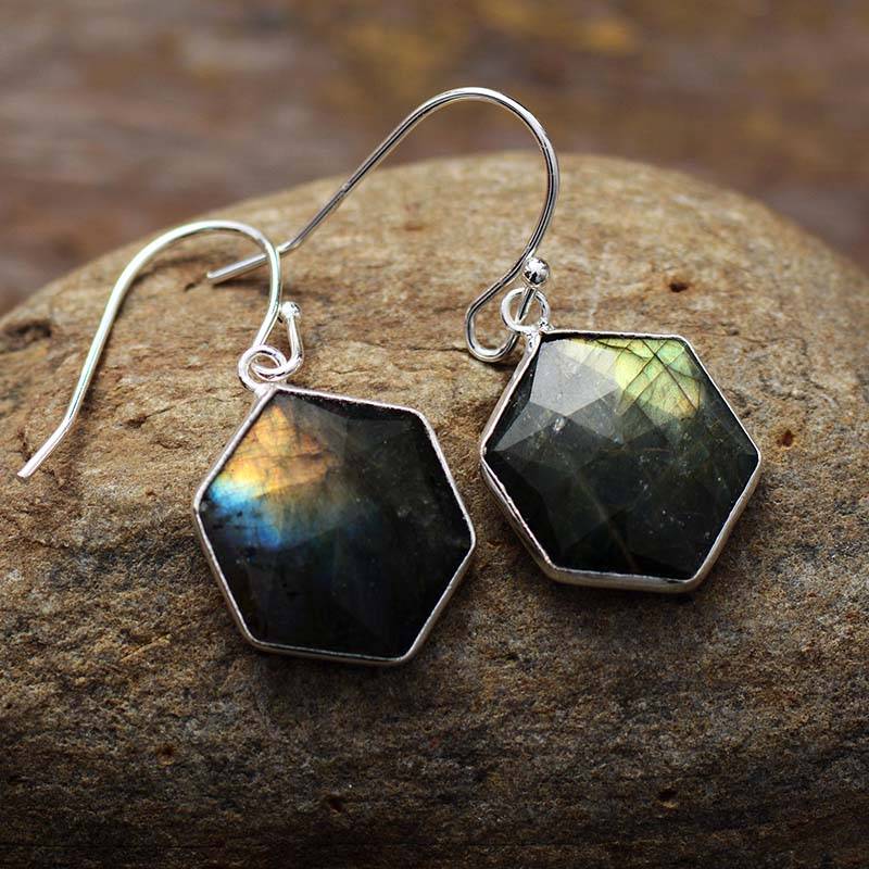 Hexagonal Labradorite Earrings on rock